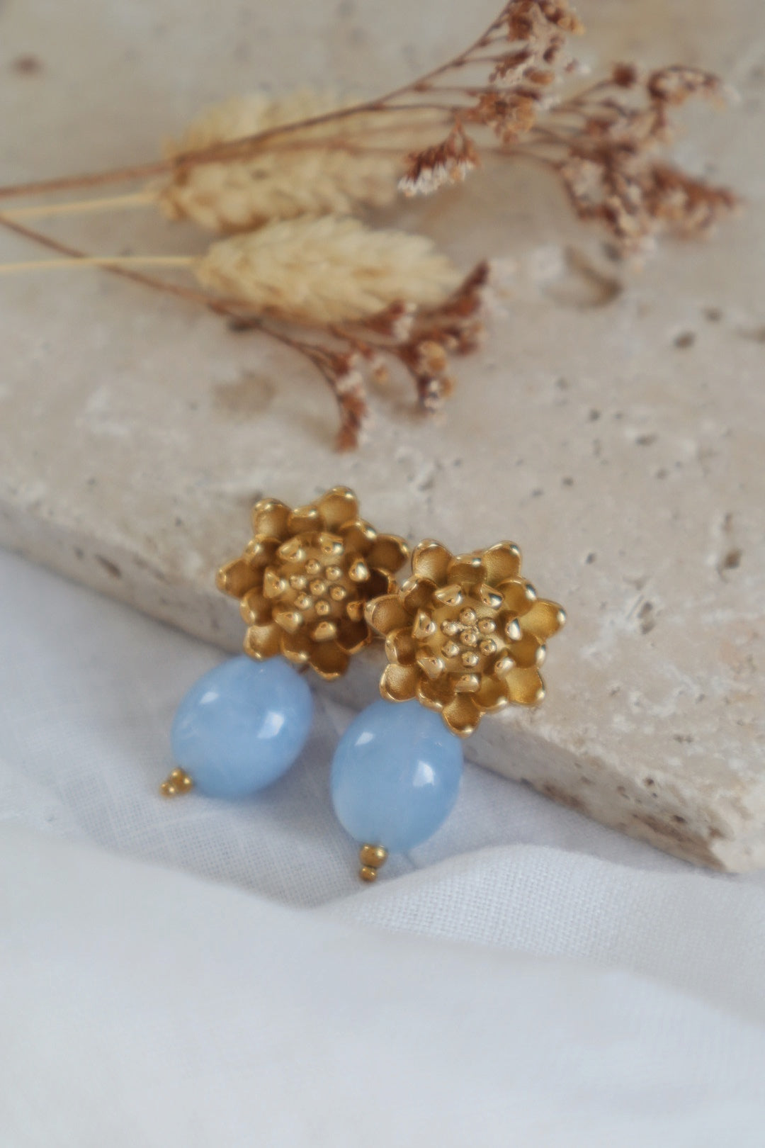 boucles d'oreilles fleur tendance 2026 fleur bleu ciel