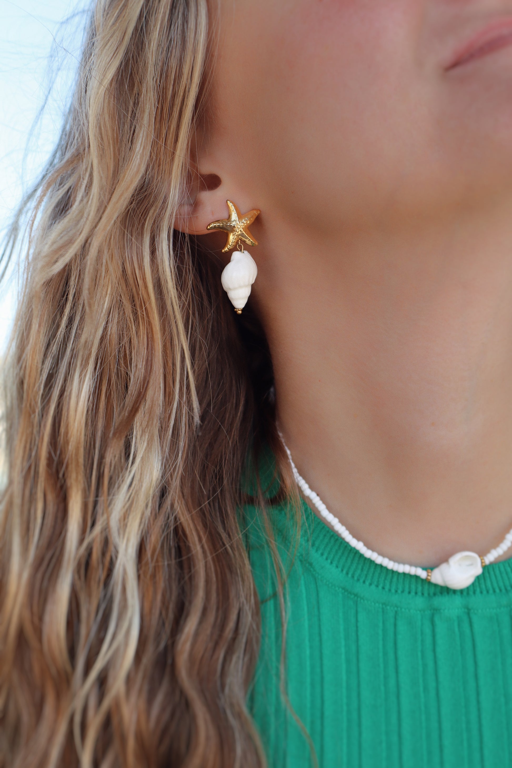 boucles étoile de mer et coquillage blanc