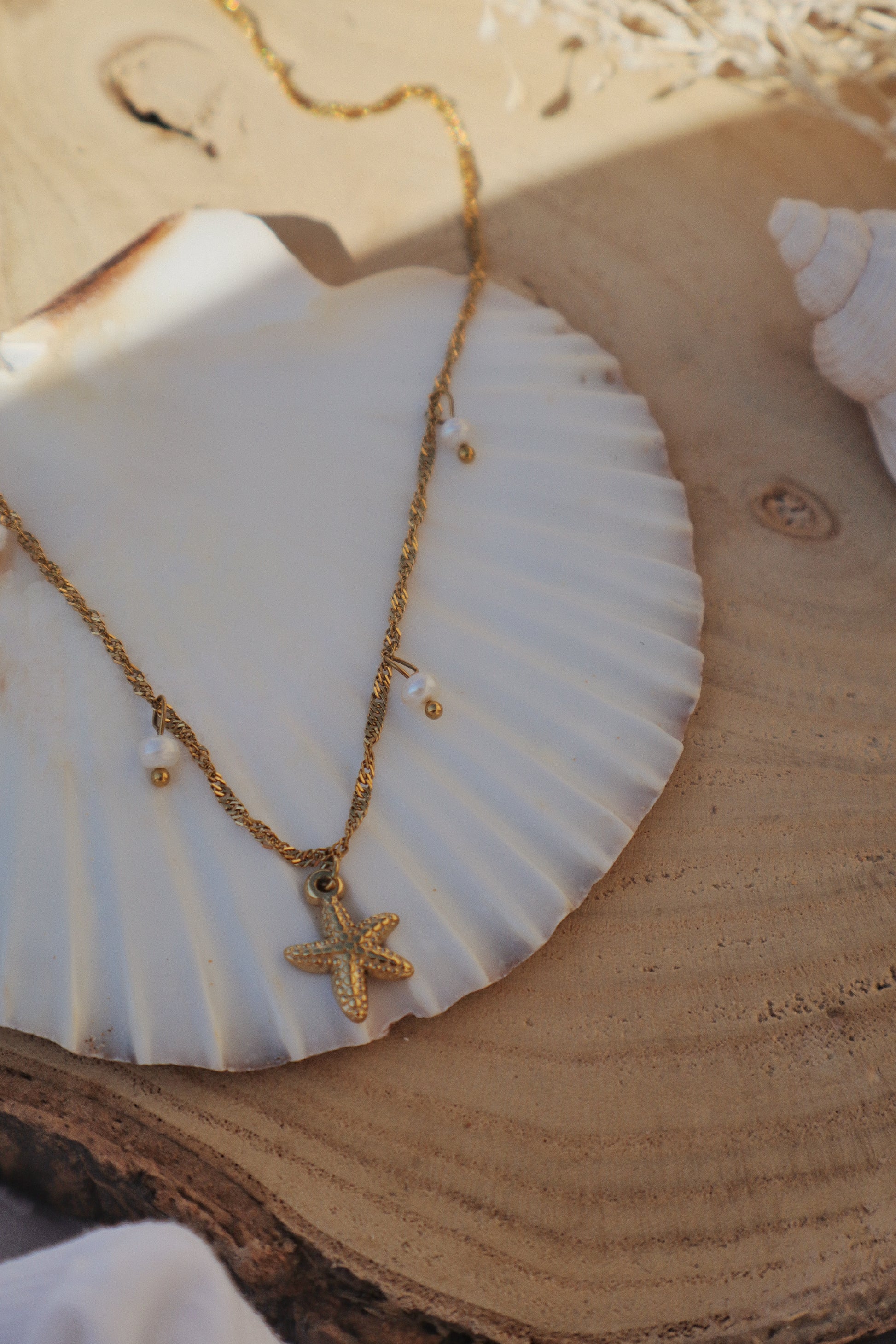 collier étoile de mer dorée